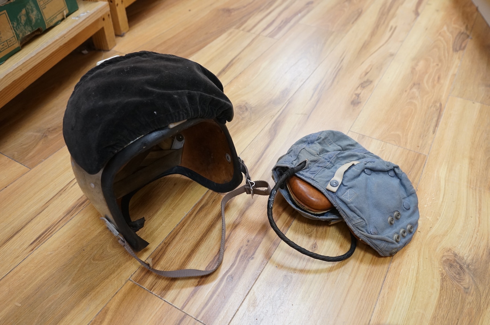 A Sykes-Fairburn Fighting Knife by Wilkinson sword in its leather scabbard, together with a 1942 Mk.III military compass by T.G.Co.Ltd. in a webbing pouch dated 1940, together with another compass, a telescope in a leath